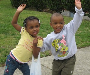 Jasmine and Christopher show their excitement after hunting for eggs.